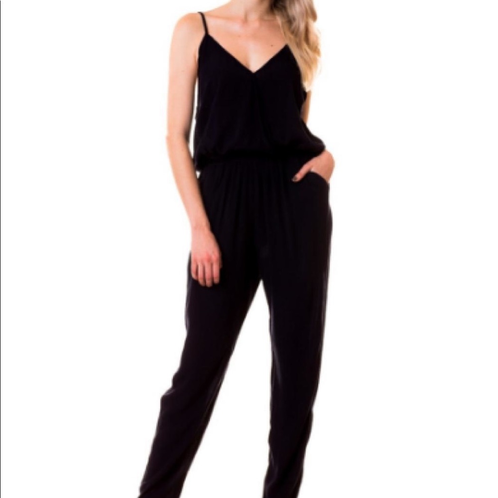 NWT sea green jumpsuit with pockets